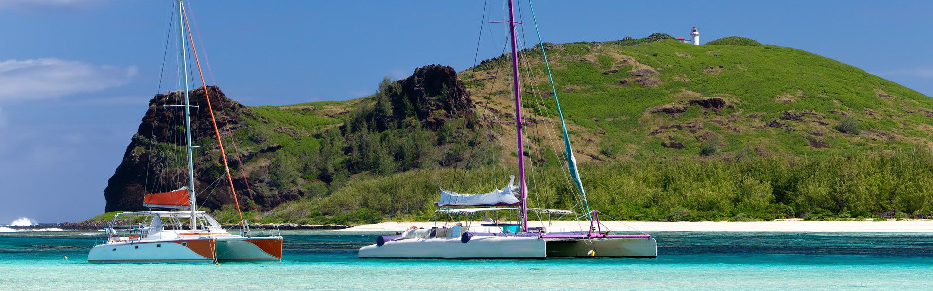 Mauritius is one of the best places for catamarans trips. Having great buoyancy and stability, catamarans are perfect for group cruises, for they can easily dock and anchor in the shallow bays and very close to the beautiful beaches and islets of Mauritius. It is the ideal way to sail the waters of the island and enjoy its picturesque panorama in complete safety and comfort. Those who dream of going for a catamaran cruise in Mauritius should definitely take the plunge, they will not regret it!